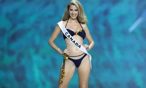 Hoa hậu 30 tuổi gây tranh cãi khi diễn áo tắm lúc mang bầu 4 tháng