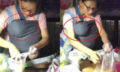 Thấy người phụ nữ bán hàng đeo túi trước ngực, khách tò mò nhìn vào rồi đồng loạt ghé mua nườm nượp