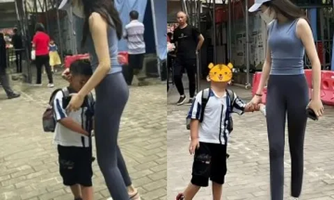 Diện đồ yoga đến trường đón con, mẹ trẻ khiến nhiều phụ huynh nhìn chằm chằm, lắc đầu ngán ngẩm