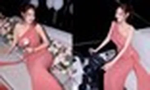 Hoa hậu Di Khả Hân diện đầm hồng ôm sát, đón tuổi mới trên du thuyền