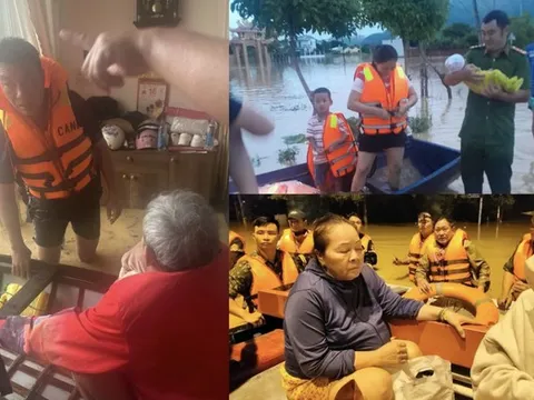 Liều mình giữa dòng nước xiết, người chỉ huy giữ an toàn cho dân