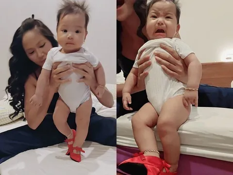 Con gái 5 tháng tuổi của Hoa hậu H'Hen Niê đeo vàng bạc đầy người, biểu cảm hài hước khi đi giày cao gót