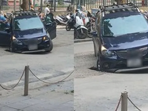 Ô tô sụt hố trước cổng Bệnh viện K Hà Nội