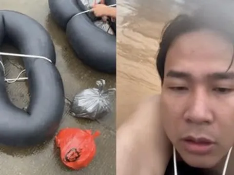 Con trai ôm lốp xe bơi hơn 3 giờ giữa lũ dữ để tìm cha mẹ