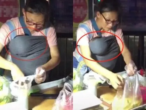 Thấy người phụ nữ bán hàng đeo túi trước ngực, khách tò mò nhìn vào rồi đồng loạt ghé mua nườm nượp